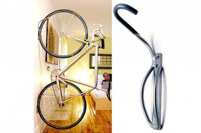Вертикальное крепление велосипеда за колесо для хранения в квартире